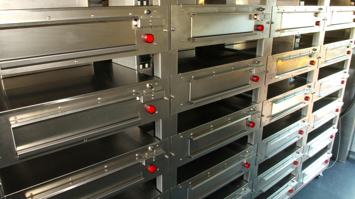 rack of ovens in the truck